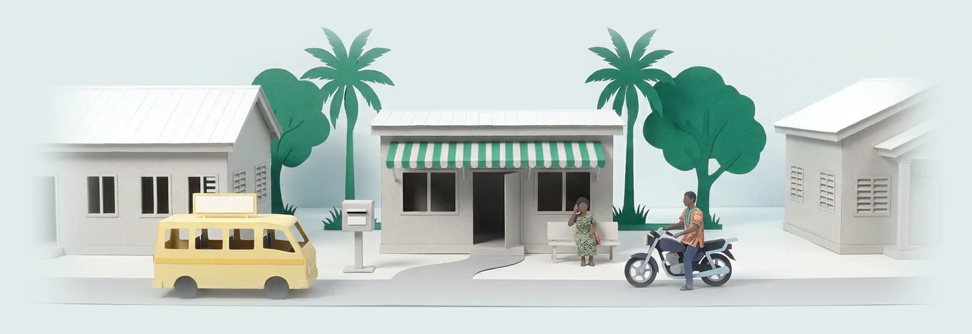Illustration: a paper street corner with a small office, a woman on the phone on a bench, a motorbike and a tro-tro.
